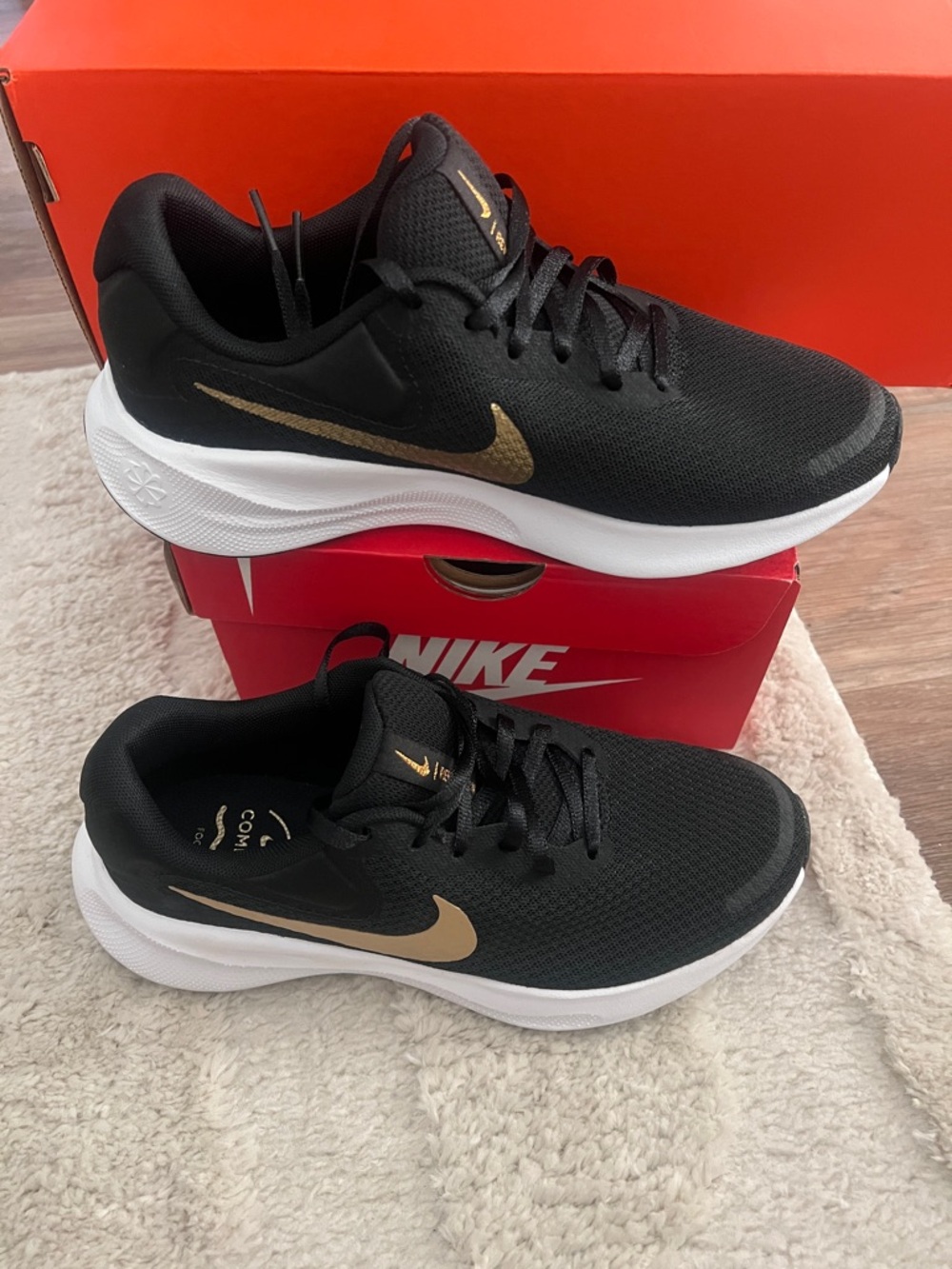 Nike Black with Gold Swoosh Running Sneakers